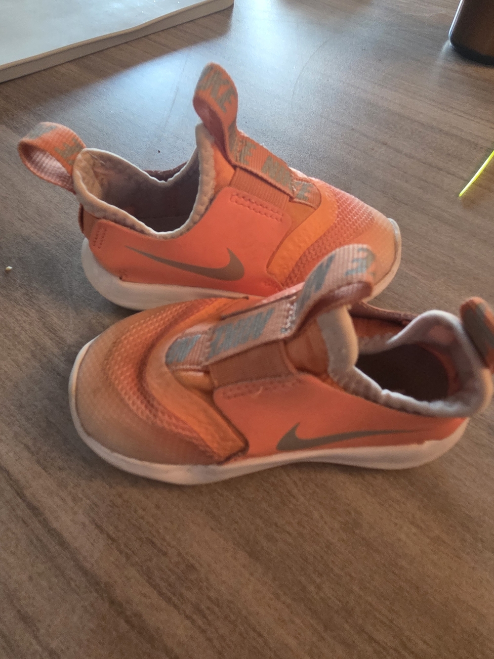 Nike Kids Orange Slip-On Sneakers with Grey Swoosh